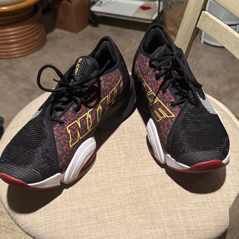 Nike Black and Red Sneakers with Yellow Accents